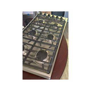Viking VGSU53616BSS 36 inch gas cooktop front angle view with black chrome knobs, open box