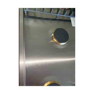 JennAir JGC3536GS gas cooktop flush-mounted in countertop showing seamless Euro-style design integration, open box, light scratch