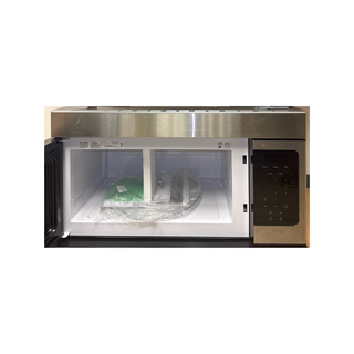 Bosch HMV3053U over-the-range microwave interior view with turntable and cooking chamber, stainless steel, open box condition