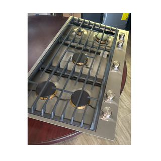 JennAir gas cooktop control knobs and white LED burner indicator lights for safety and modern design, open box