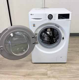 LG WM1455HWA 24 inch Smart Compact Washer | Open box front interior view