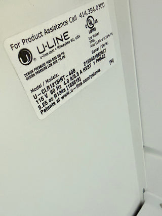 U-Line CLR1215INT-40B 15 inch Panel Ready Clear Ice Machine - Open Box, side view, serial number