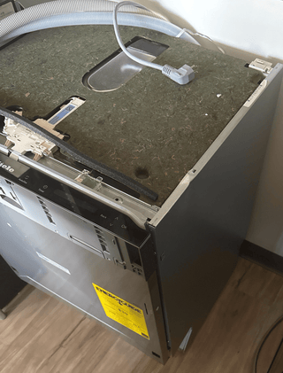 Miele 24" built-in dishwasher, dent on side, stainless steel, Model G7591SCVi (Open Box), top view